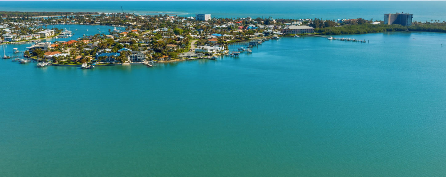 Ft Pierce luxury waterfront neighborhood aerial with ocean access homes by Edwin Figueroa Photography