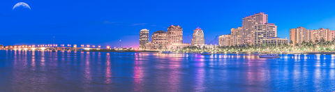 Blue hour skyline panorama of West Palm Beach Florida with waterfront reflections captured by Edwin Figueroa Photography real estate photographer