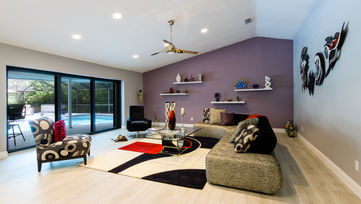 Spacious master bedroom in Jupiter home by Edwin Figueroa Photography