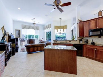 Elegant staircase in Port St. Lucie home photographed by real estate photographer in Port St. Lucie
