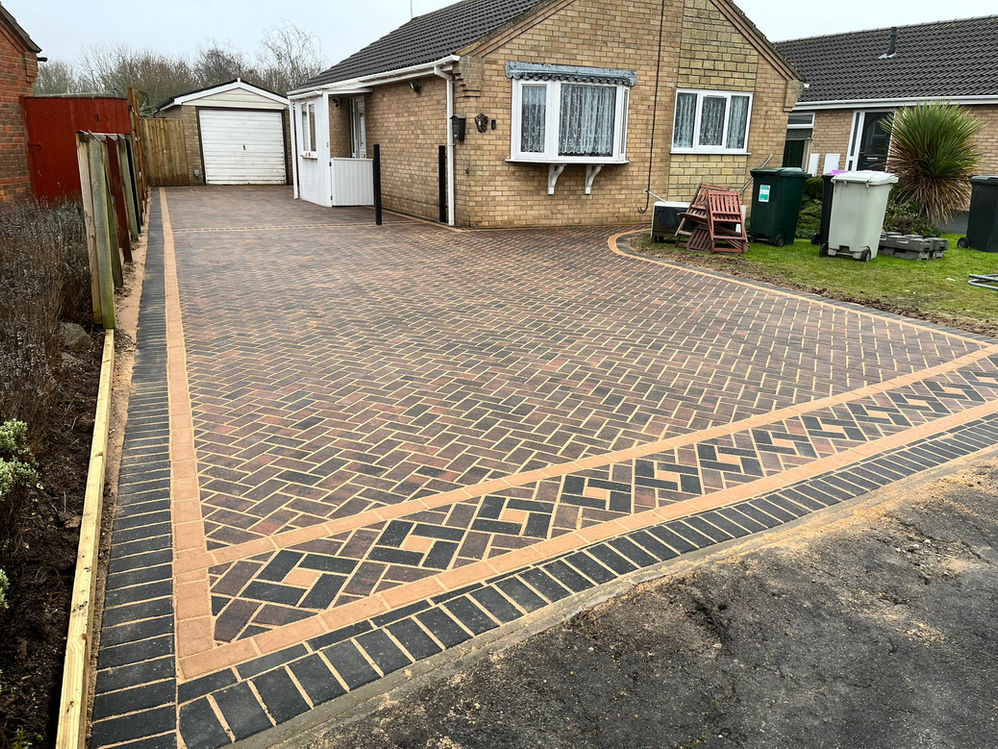 Brindle block pavers with a charcoal and buff edging Aztec Driveways in Boston Lincolnshire