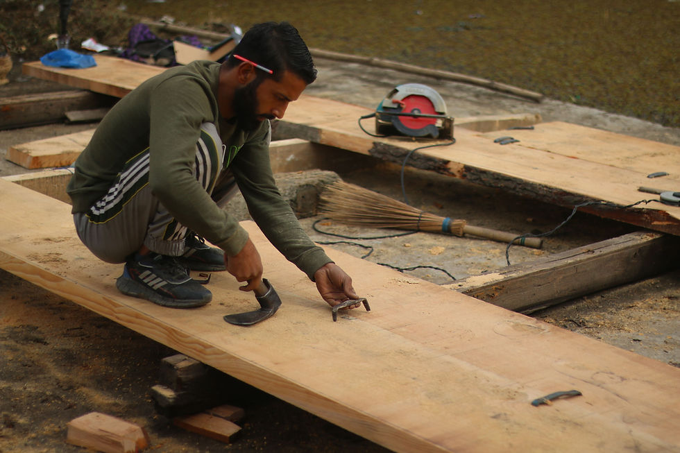 Mohammad Rafiq working on timber joinery for the boat hull. Photo credit: Anto Gloren and Sayali Athale