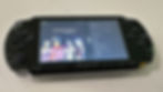 Black Sony PSP showing the TRAX track info panel for an MP3, with Generation X Anthology album art