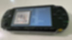 Black Sony PSP showing the TRAX track info panel for a 24-bit/192 kHz FLAC, with America album art