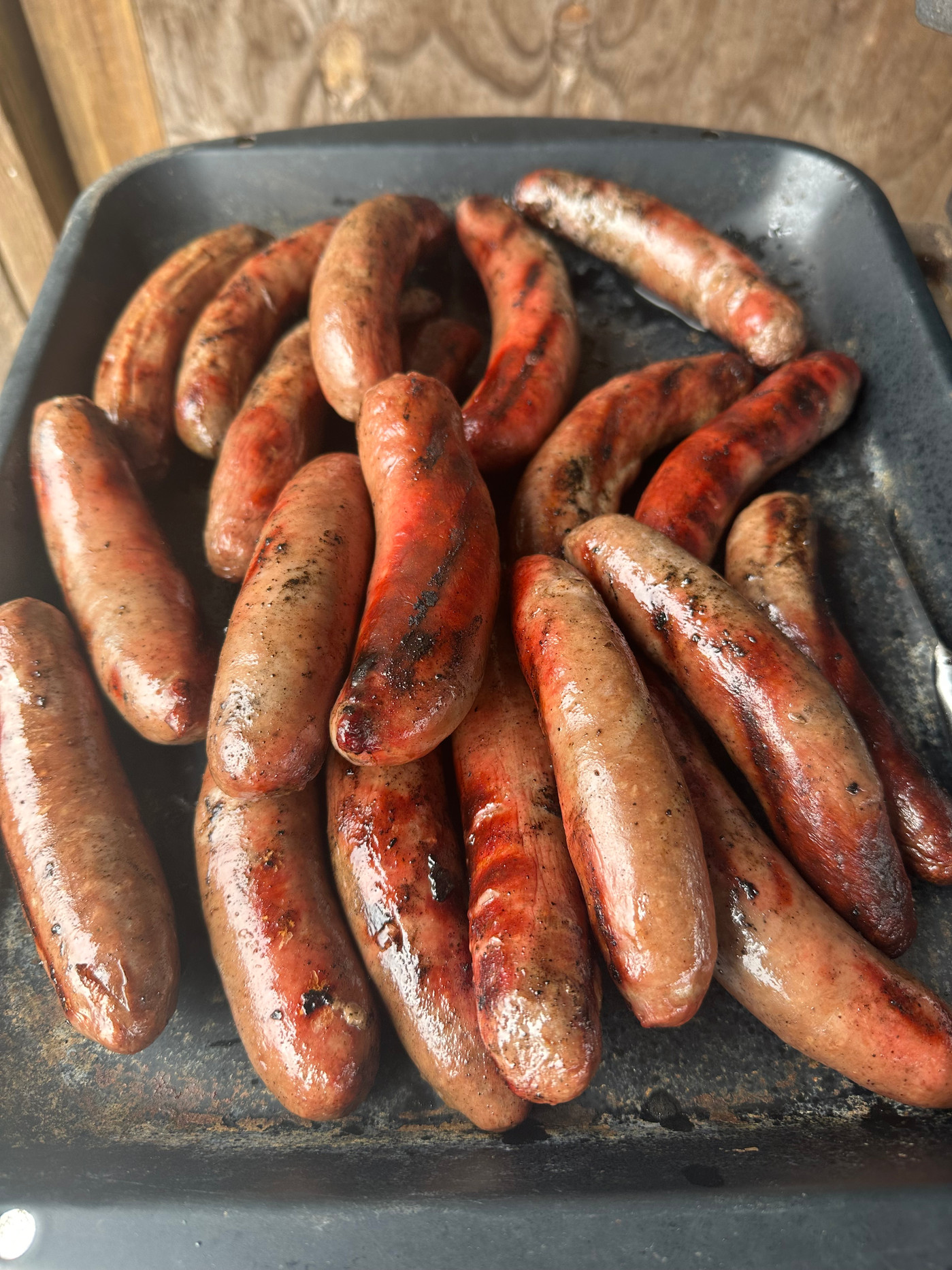 Gourmet beef brats neatly packed for a summer barbecue.