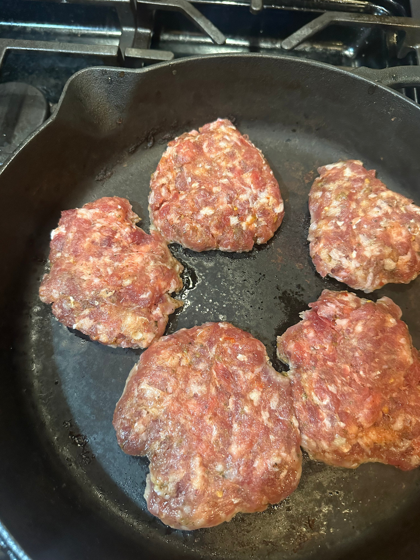 Artisanal sugar-free pork sausage links ready for cooking.