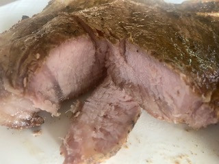 Tender pasture-raised pork chops in vacuum-sealed packaging.
