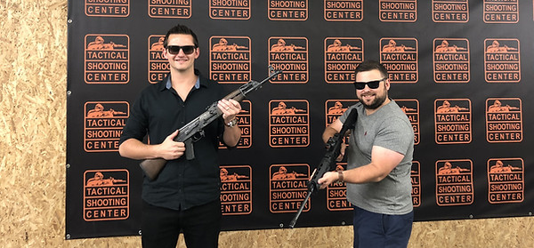 Martin and Michael shooting guns.jpg