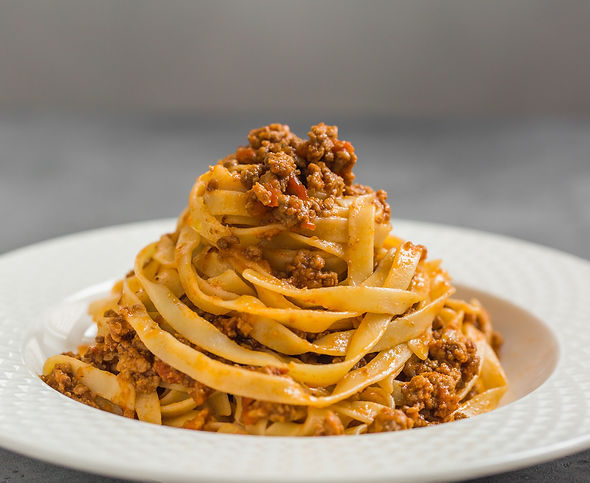 Tagliatelle al ragù alla Bolognese - long, flat egg pasta with a meat sauce or Bolognese s