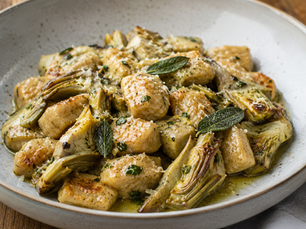 Italian spelt gnocchi with artichokes, herb butter and Pecorino Romano