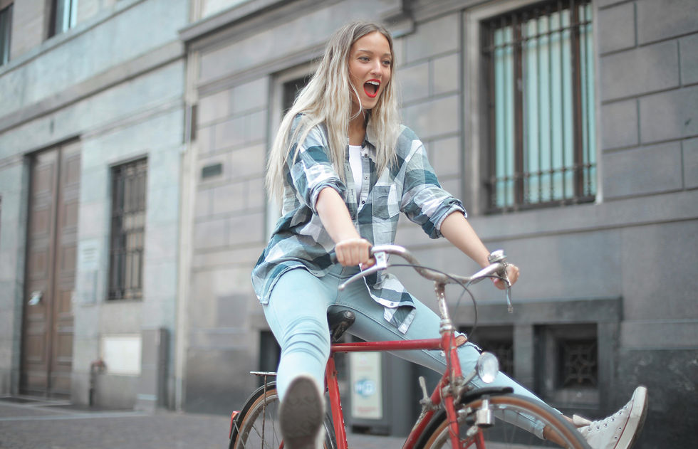 a woman enjoying a bicycle ride