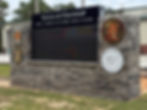 Close-up view of an LED emergency alert sign on a roadside