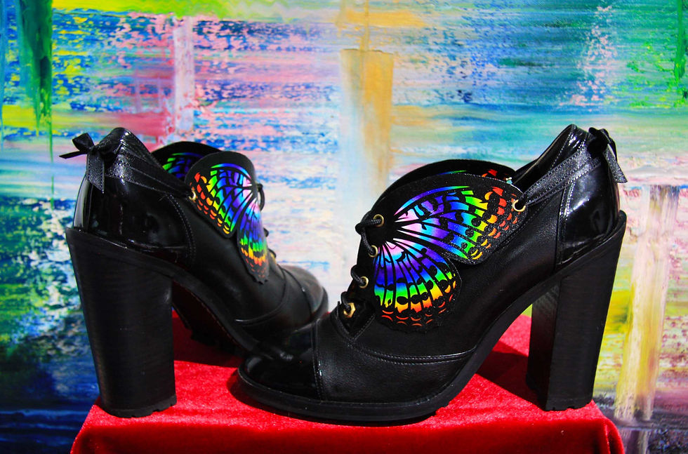 Thumbnail: Lace-up Booties with some Progress Pride Flag Butterfly Shoe Wings tied back securely