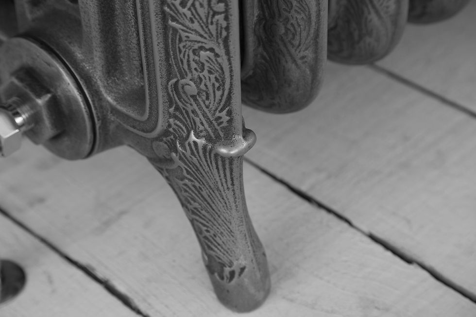 Thumbnail: Ribbon 4 Column cast iron radiator feet close up