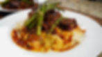 A plate of Braised Short ribs and Mashed Potatoes