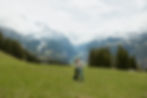 Editorial Wengen Lauterbrunnen Couple Elopement Couple Session Green Meadow Snow Caps Mountain