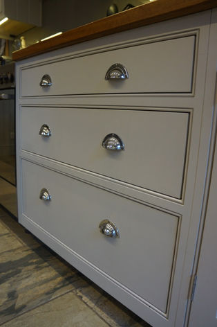 Graduated three drawer bespoke kitchen base unit.