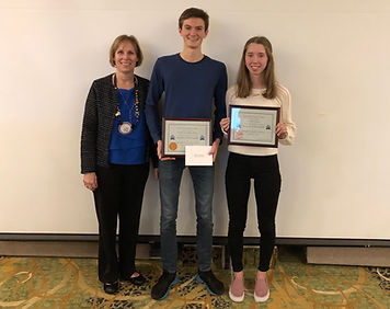 President Hanrahan recognizes the December Students of the Month Noah Goodwin-Rice and Emma Allen for the Rotary Club of Newport.