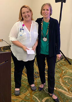 President Hanrahan welcomes guest speaker Theresa Karlik