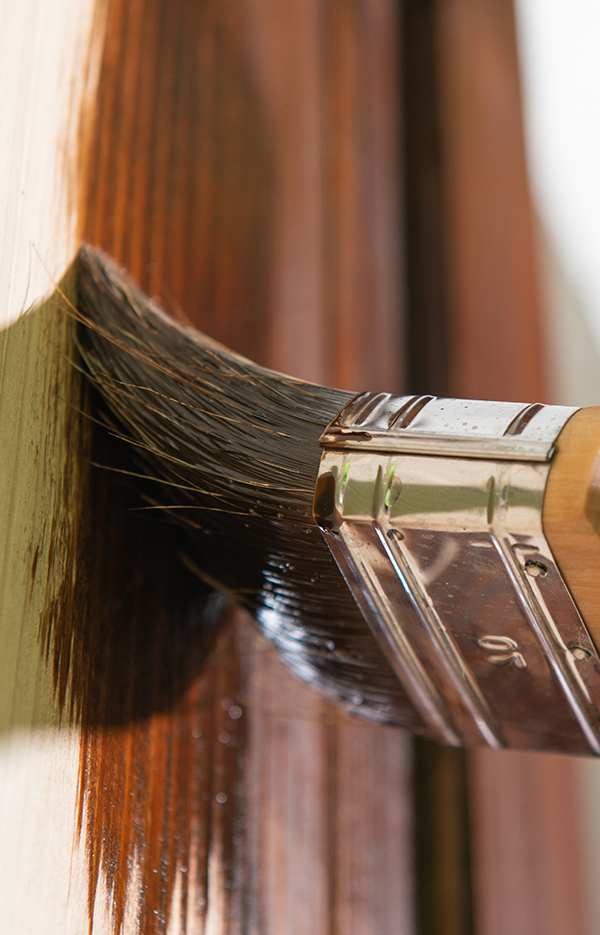 Paintbrush staining wood