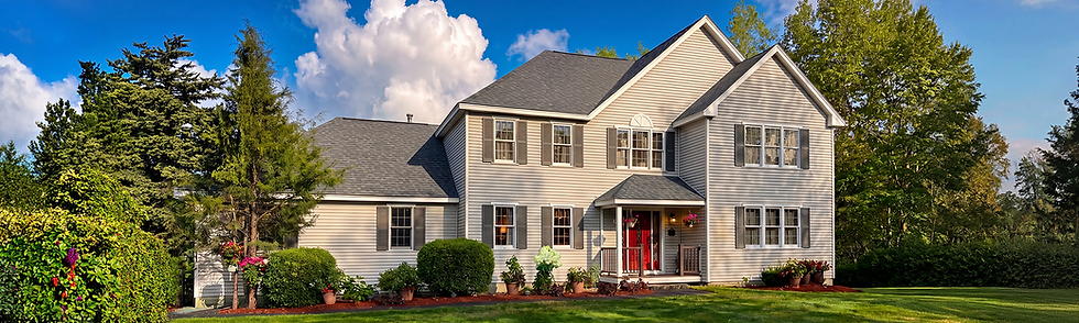 Modern two-story house with a new asphalt shingle roof