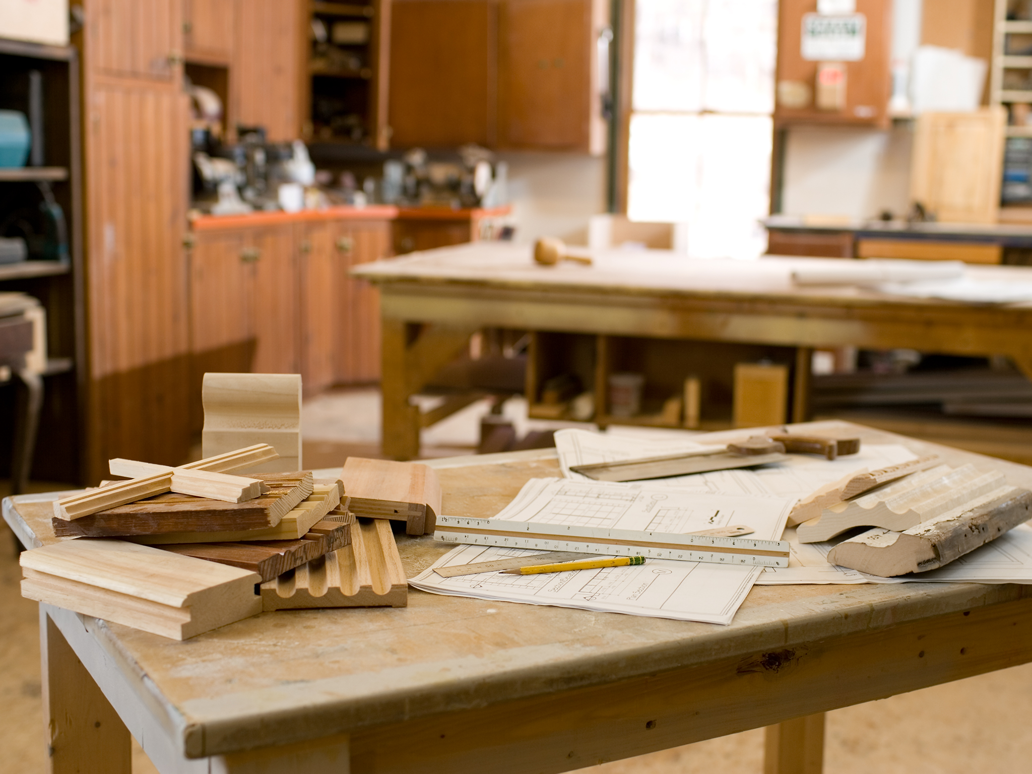 Woodworking shop: samples, blueprints, pencil