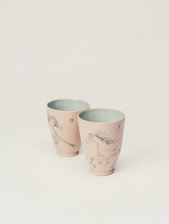 Two cups with Horse drawings and light blue interiors