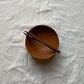 aerial shot of a bowl with an olive fork rested over the top