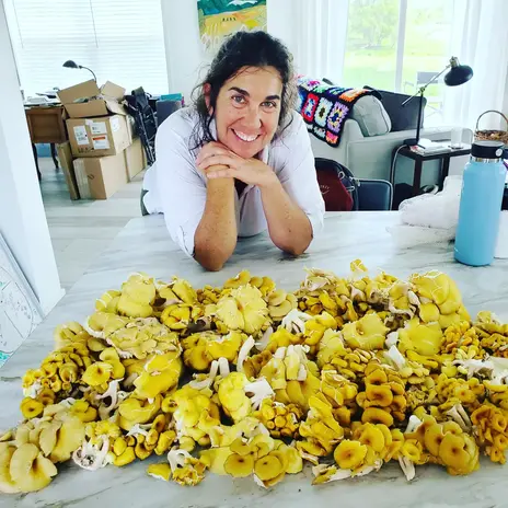 Rabinowitz foraging for golden oyster mushrooms.jpg