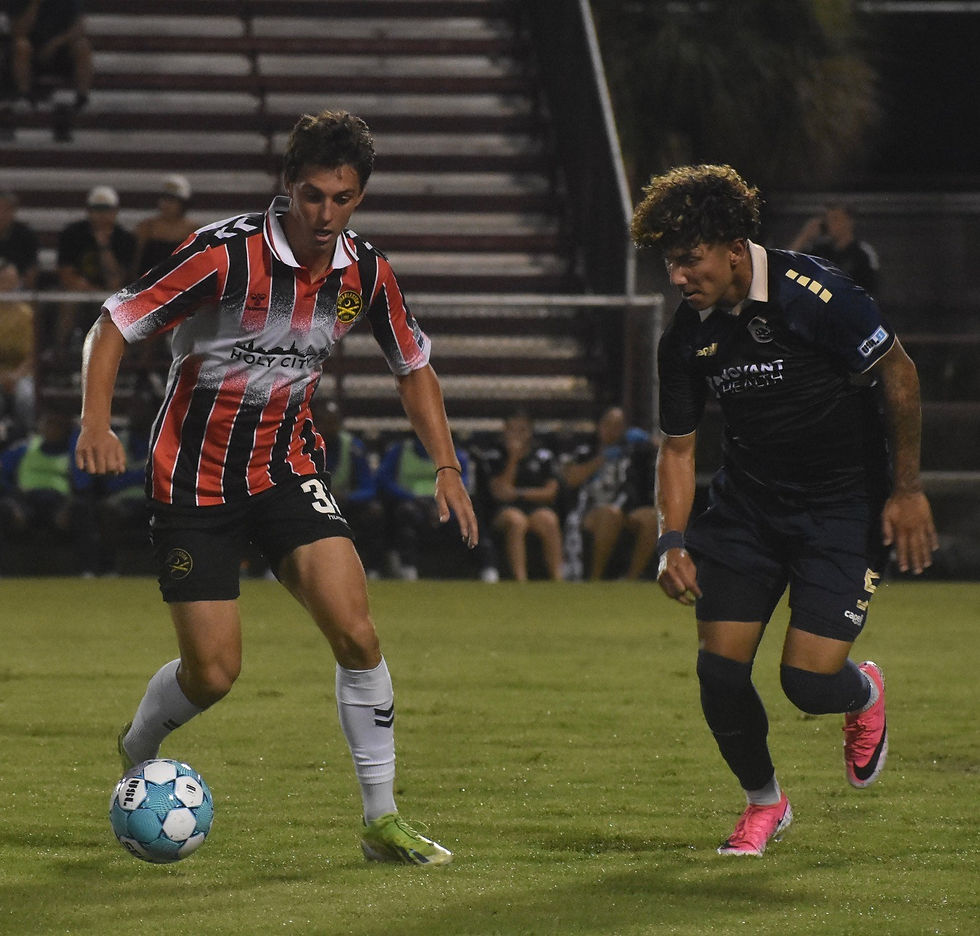 Midfield duels from USL Cup match in Charleston     Photo by Wade Wimberly