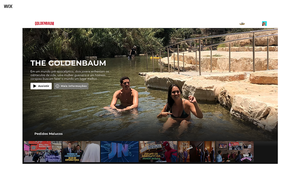 Page Wix THE GOLDENBAUM: deux personnes souriantes nagent dans un bassin naturel, rochers, végétation, boutons Assister et Infos.