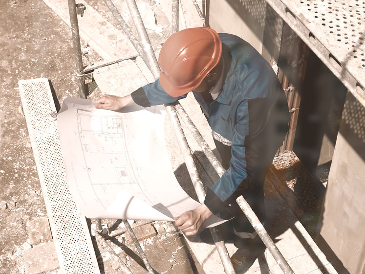 Looking%20Over%20Architectural%20Plans_edited.jpg