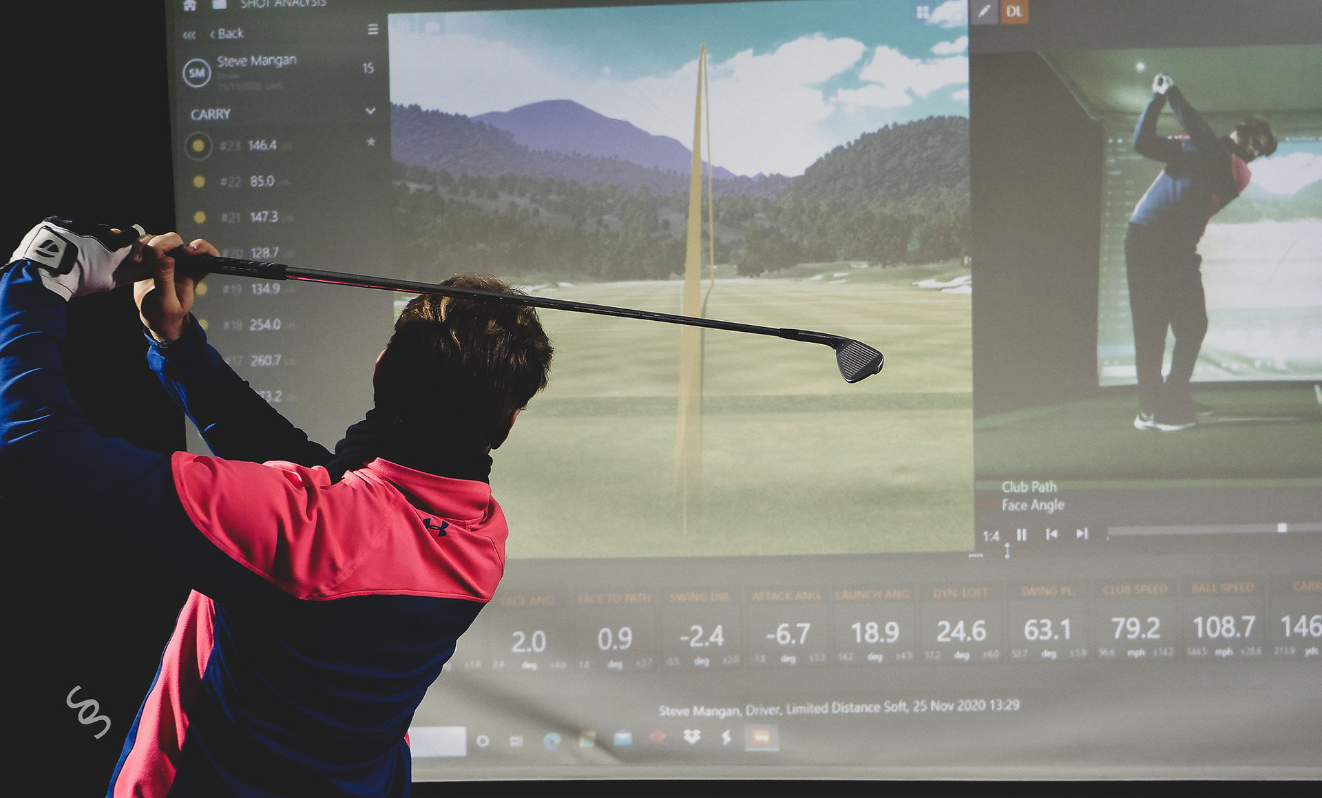 Golfer practicing using a Trackman Simulator