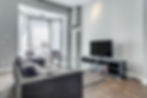 Stylish living room with coffee table in furnished Toronto rental