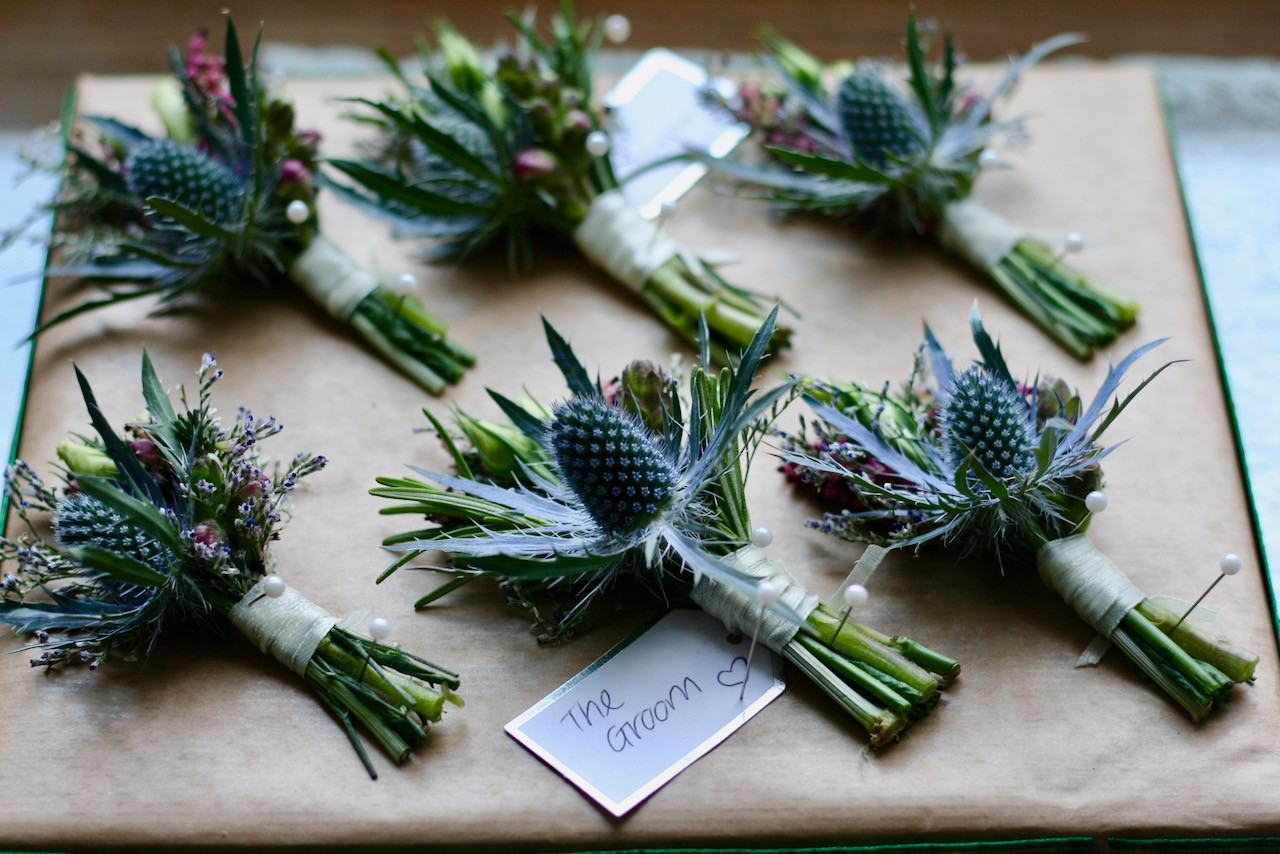 Thistle buttonholes for the Grooms