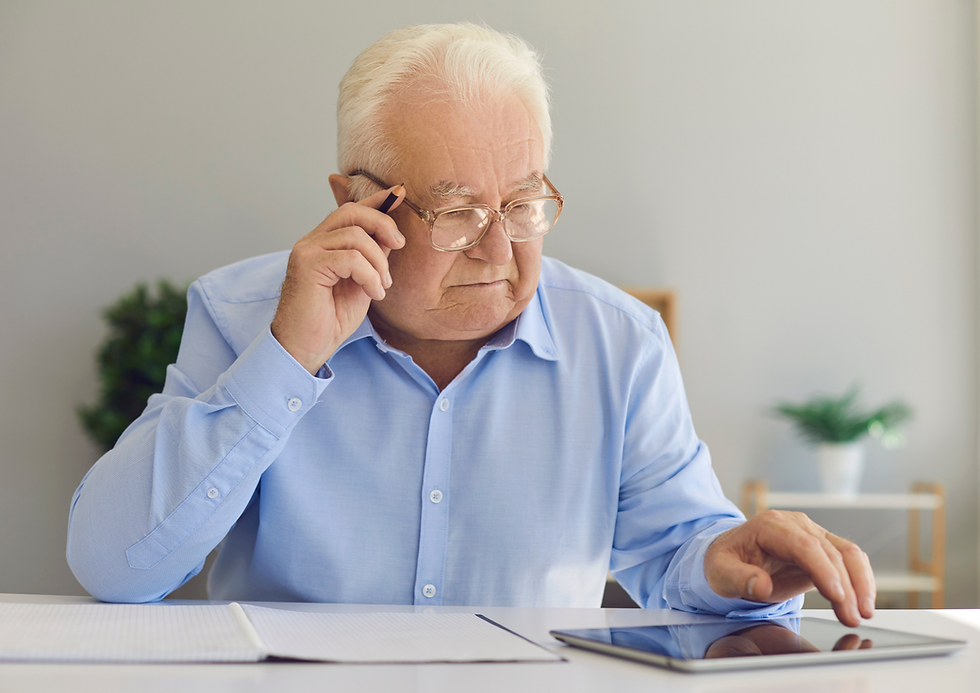 Retiree reviewing retirement budget and financial planning options