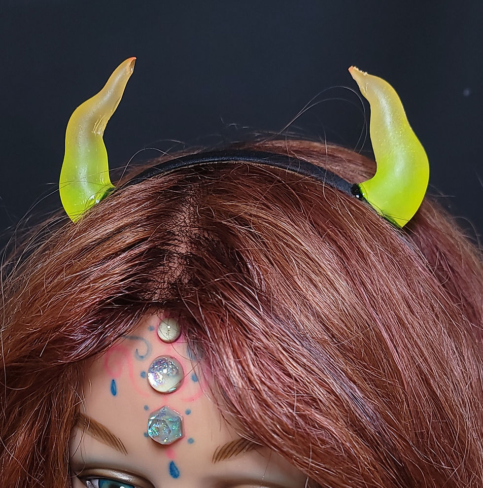 Thumbnail:  Blacklight reactive Horn headbands