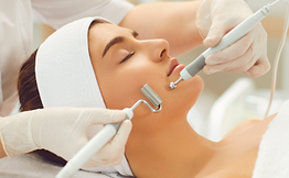 A relaxing Ultra Visage non-surgical facelift facial taking place at Touch of Paradise, using advanced microcurrent technology to lift, tone and firm facial contours for a more youthful appearance.