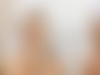 Woman gently dabbing eye cream around the under-eye area to hydrate skin and reduce puffiness