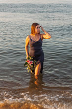 woman emerging from Virginia Beach ocean like a goddess