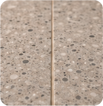 Polished stone benchtop joint after seamless professional restoration.