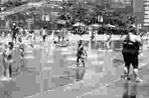 Kids playing in water fountain. Philadelphia, PA.
