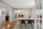 Modern staged dining room with natural light – Sleek Staging Studio