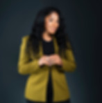 Neek in green blazer. Professional home stager portrait