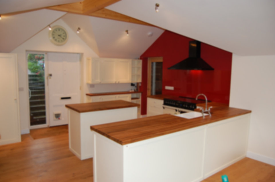 Kitchen area with Zebrano tops and paint