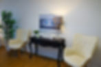 Waiting area with two armchairs and a desk in Winter Haven, FL