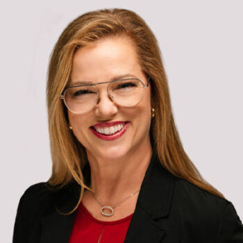 Smiling woman with glasses in Winter Haven, FL