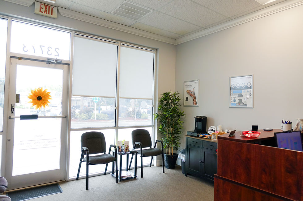 Office waiting area with chairs and reception desk