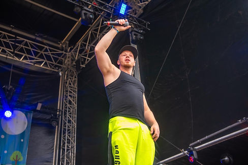 Noughty Nineties performing their energetic 90s and 00s party set at a festival