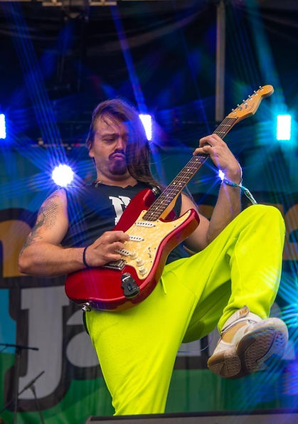 Noughty Nineties performing energetic 90s and 00s party set at a festival